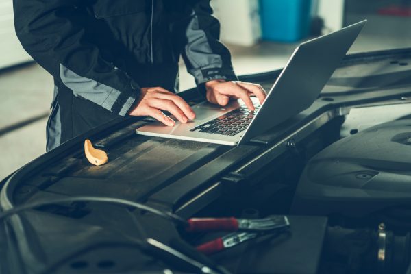 Car Mechanic with Computer Car Mechanic with Computer